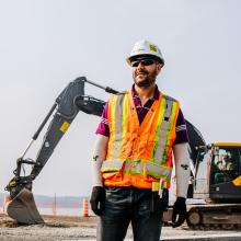 Englobe employee on construction site