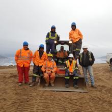 Indigenous employees on a tractor