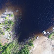 Aerial photo of a river and river banks with trees