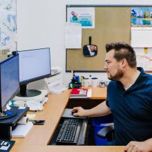 Man employee working in his office