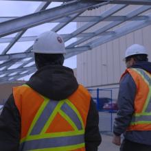 Workers in a shopping mail worksite