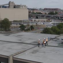 Men on a roof