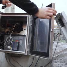 Worker opening a seismograph