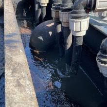 Inlet separator with floating napl