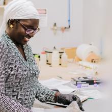 A woman working in a lab