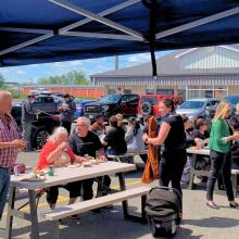 People enjoying BBQ at Englobe