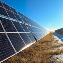 view of solar panels under the sun on blue sky