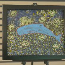 Whale painting by Alan Syliboy, Indigenous artist who produce a custom designed art piece for the Englobe's Dare.Care.Change Award recipient