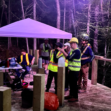 Akadi Lumina project team installing the work