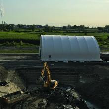 Mobile ventilated shelter platform to decontaminate work zone particularly dangerous due to the presence of vinyl chloride and 1,2-dichloroethane (DCA)