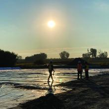 Environmental remediation workers at sunset at former Petromont petrochemical plant