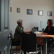 photo of Natacha Sénéchal having a work session with a colleague in her office