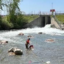 photo of a man in a in-stream spawning ground