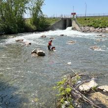 photo of environmental expert in a river